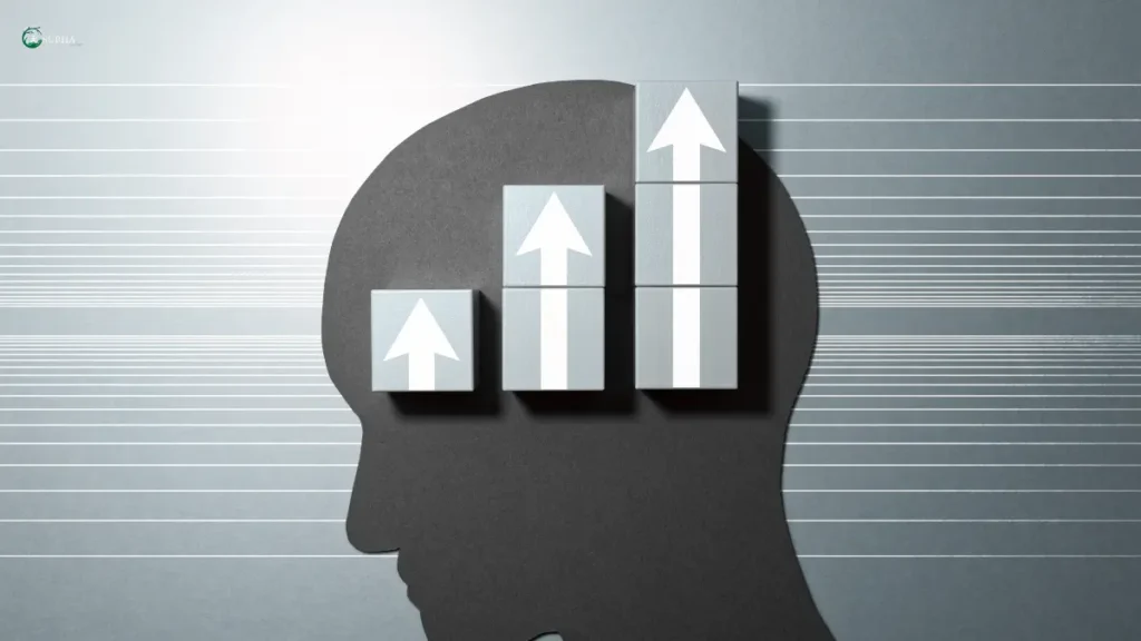 Silhouette of a head with ascending bar graph blocks symbolizing cognitive growth.