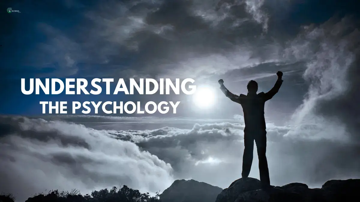 Silhouette of a person raising fists on a mountain with 'Understanding the Psychology' text