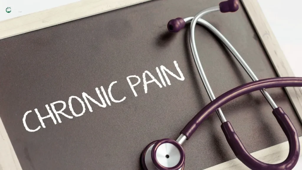 Stethoscope placed beside a chalkboard with "Chronic Pain" written on it, symbolizing the psychological effects of persistent pain