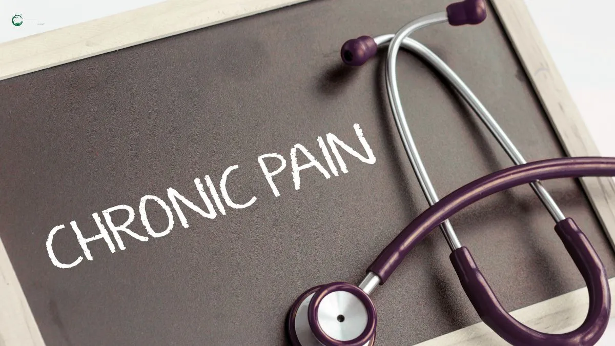 Stethoscope placed beside a chalkboard with "Chronic Pain" written on it, symbolizing the psychological effects of persistent pain