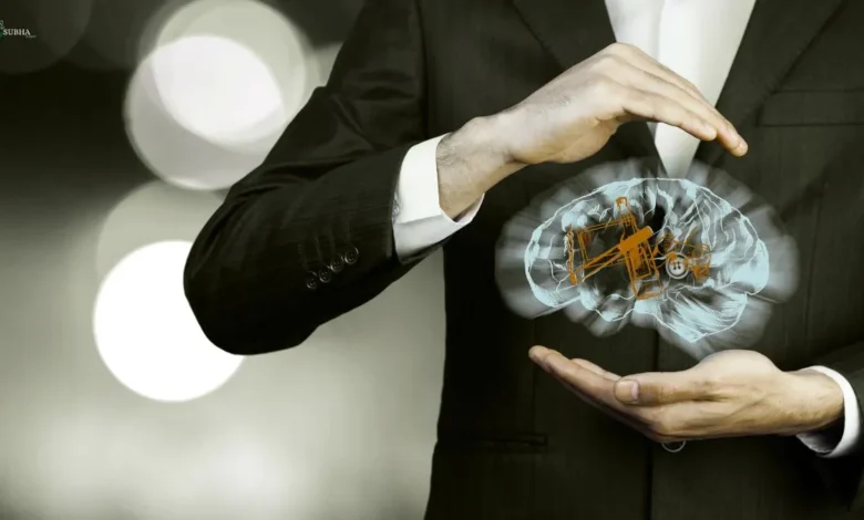 A businessman holding a digital brain model, representing the psychology of habit formation and how the brain builds and breaks habits.