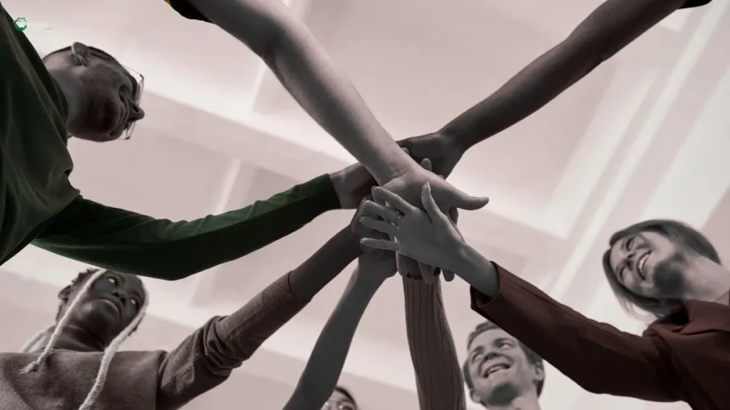 Teamwork symbolizing how dopamine and motivation boost focus and productivity.