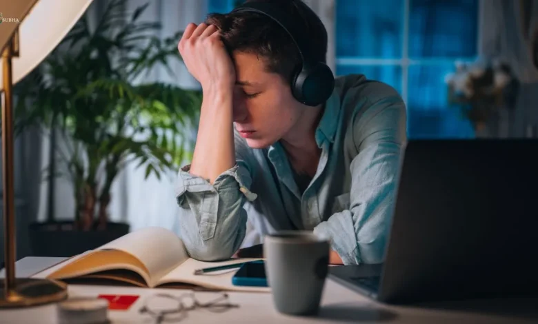Stressed person experiencing workplace burnout at night