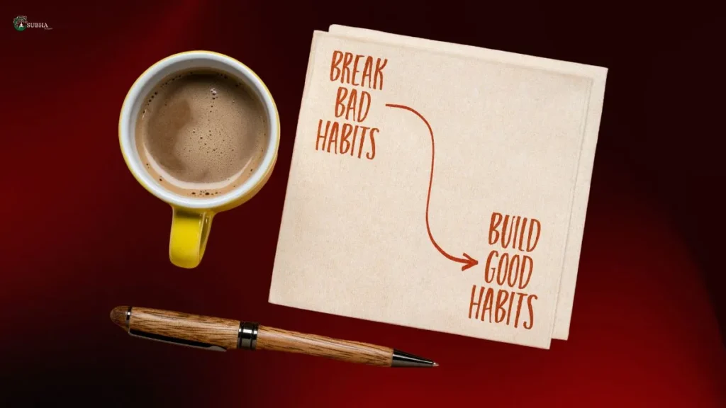 A napkin with 'Break Bad Habits → Build Good Habits' written beside a coffee mug and pen, symbolizing the journey from negative to positive behavior patterns.