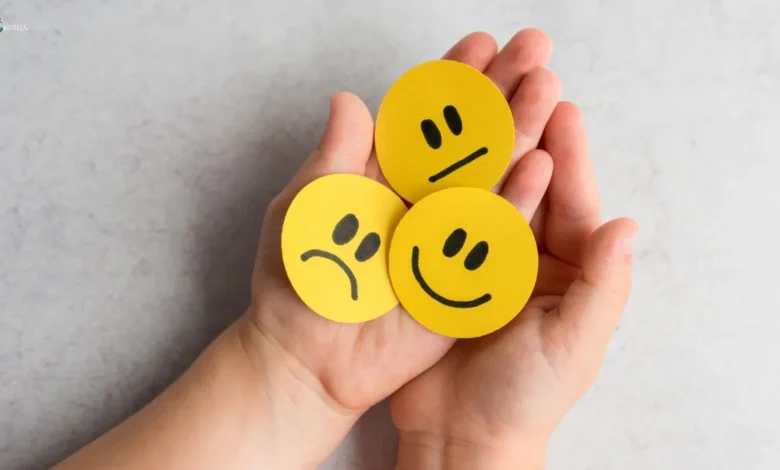 Emojis in hand showing emotional intelligence in relationships.