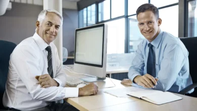 Businessmen discussing mental health myths and AI solutions in office