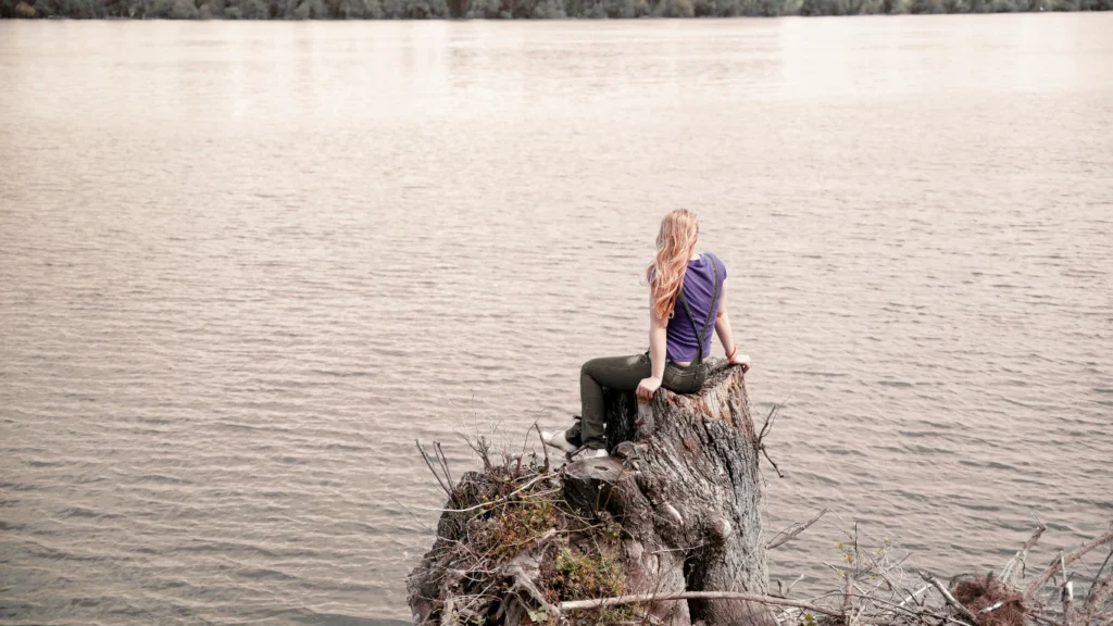 Centaur AI Model concept showing human reflection by a lake