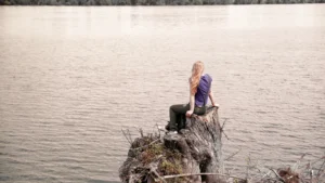 Centaur AI Model concept showing human reflection by a lake